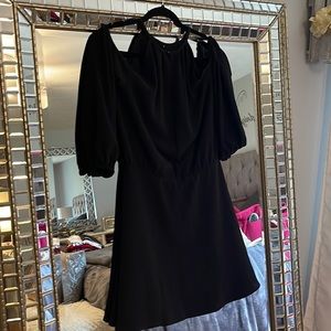 Brand New black colder shoulder dress.
